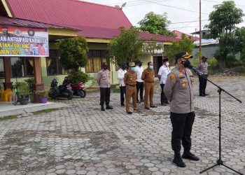 Kapolsek Tualang Pimpin Apel Gabungan Kesiapsiagaan Antisipasi Karhutla.