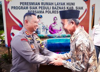 Cooling System Pemilu, Kapolres Siak Salurkan Zakat Personil Wujudkan Rumah Layak Huni Untuk Masyarakat
