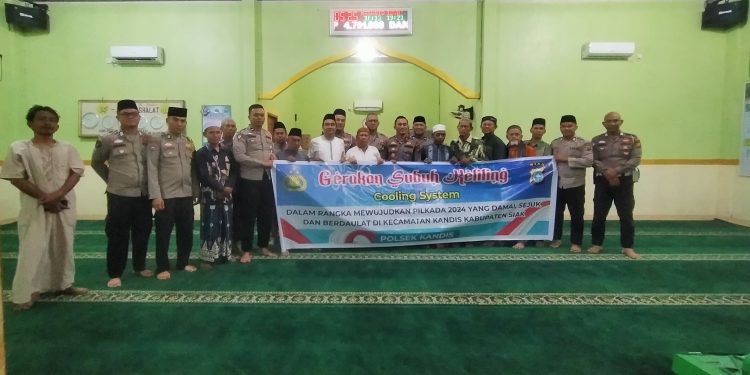Cooling System, Subuh Keliling Polsek Kandis Sampaikan Pesan Pilkada Damai Kepada Masyarakat