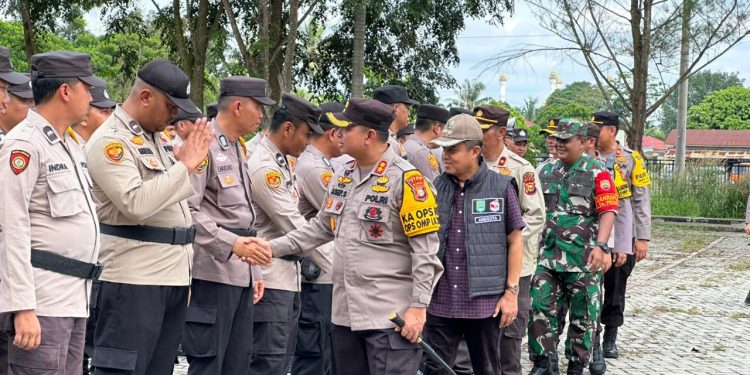 Kapolres Pimpin Apel Pelepasan BKO Personil Polda Riau PAM Pilkada 2024, Kabupaten Siak