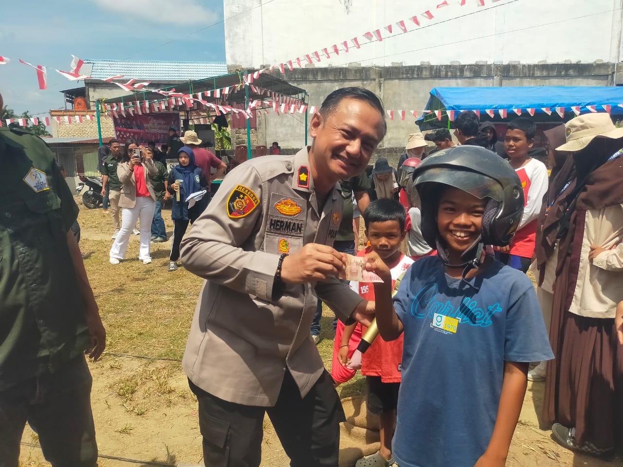 Sambut HUT RI Ke-80 Kapolsek Kandis hadiri Pesta Rakyat