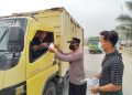 Antisipasi ISPA akibat Asap, Polres Siak dan Jajaran Turun ke Jalan Bagikan Ribuan Masker